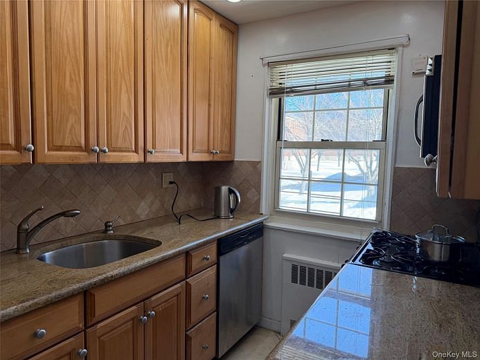 211-19 73 Avenue #1