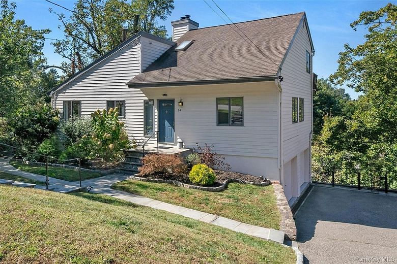 34 Piping Rock Drive