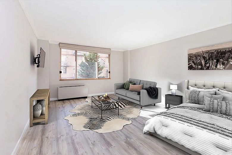 393 West 49th Street #3OO
