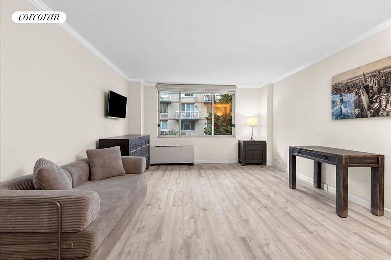 393 West 49th Street #3OO