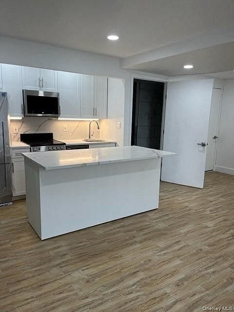 6334 Fresh Pond Road #1A