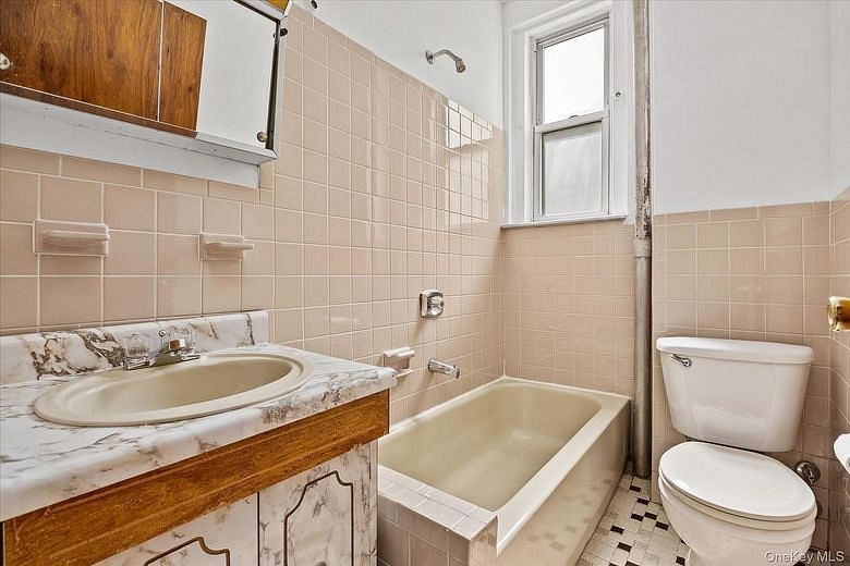 64-09 39 Avenue #43